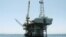 FILE - Platform Holly, an oil drilling rig in the Santa Barbara Channel offshore of Goleta, Calif., will be decommissioned and its operator is seeking bankruptcy protection nearly two years after the platform was idled when an onshore pipeline ruptured and spilled a massive amount of oil into the ocean, the state and Venoco said April 17, 2017.