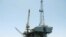 FILE - Representative illustration of an offshore oil drilling and production platform. Image taken 4.17.2017