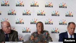 FILE - Brazil's Foreign Minister Mauro Vieira, South Africa's Foreign Minister Naledi Pandor and Russia's Foreign Minister Sergei Lavrov attend a press conference as BRICS foreign ministers meet in Cape Town, South Africa, June 1, 2023. 