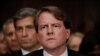 FILE - President Trump's White House counsel, Don McGahn, right, is seen on Capitol Hill in Washington, Feb. 6, 2017.