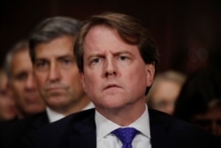 FILE - White House counsel Don McGahn listens during testimony before the Senate Judiciary Committee on Capitol Hill in Washington, Sept. 27, 2018.