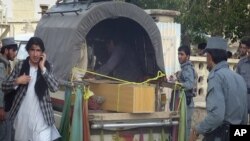 A casket containing the body of one of the Afghans, who were killed by insurgents attack in Waza-e Zadran of Paktia, in Gardez, Paktia, Afghanistan, May 19, 2011