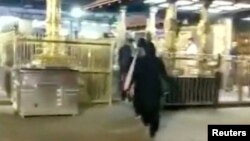 Two women enter the Sabarimala Temple in Pathanamthitta, Kerala, India, Jan. 2, 2019. (Kerala Police/Handout) 