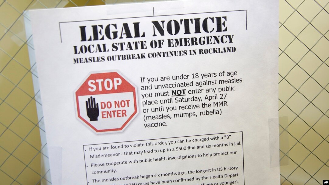 A sign explaining the local state of emergency because of a measles outbreak at the Rockland County Health Department in Pomona, N.Y., March 27, 2019.