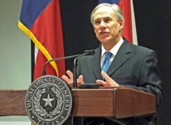 FILE - Texas Attorney General Greg Abbott speaks at a news conference in Austin, Texas, about a lawsuit challenging the president's use of an executive order to ease the threat of deportation for some undocumented immigrants, Dec. 3, 2014.