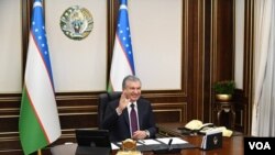 Uzbek President Shavkat Mirziyoyev holds a virtual meeting in his office, May 21, 2021, Tashkent, Uzbekistan. (president.uz)