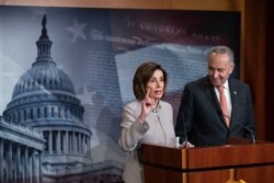 FILE - House Speaker Nancy Pelosi of Calif., joined by Senate Minority Leader Chuck Schumer of N.Y., speaks during a news conference, on Capitol Hill, Feb.11, 2020.