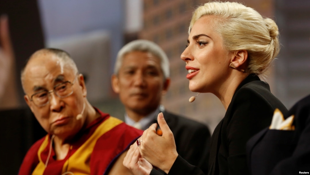 The Dalai Lama and singer Lady Gaga appear together for a question and answer session on "the global significance of building compassionate cities" at the U.S. Conference of Mayors 84th Annual Meeting in Indianapolis, Indiana United States, June 26, 2016.