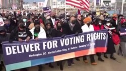 马丁·路德·金的家人参加游行 呼吁通过投票权法案