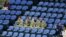 Soldiers sit in the empty seats held by the IOC as they watch the women's gymnastics qualification in the North Greenwich Arena during the London 2012 Olympic Games July 29, 2012.