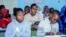 FILE - Boys sit in a classroom at Nouadhibou's Organization for the Support of Migrants and Refugees, Mauritania, Jan. 7, 2025.