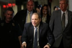 Harvey Weinstein arrives at a Manhattan courthouse for jury deliberations in his rape trial, in New York, Feb. 24, 2020.