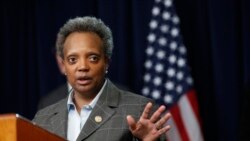 Chicago mayor Lori Lightfoot responds to a question after Illinois Gov. J.B. Pritzker announced a shelter in place order to combat the spread of the Covid-19 virus, during a news conference, March 20, 2020, in Chicago.