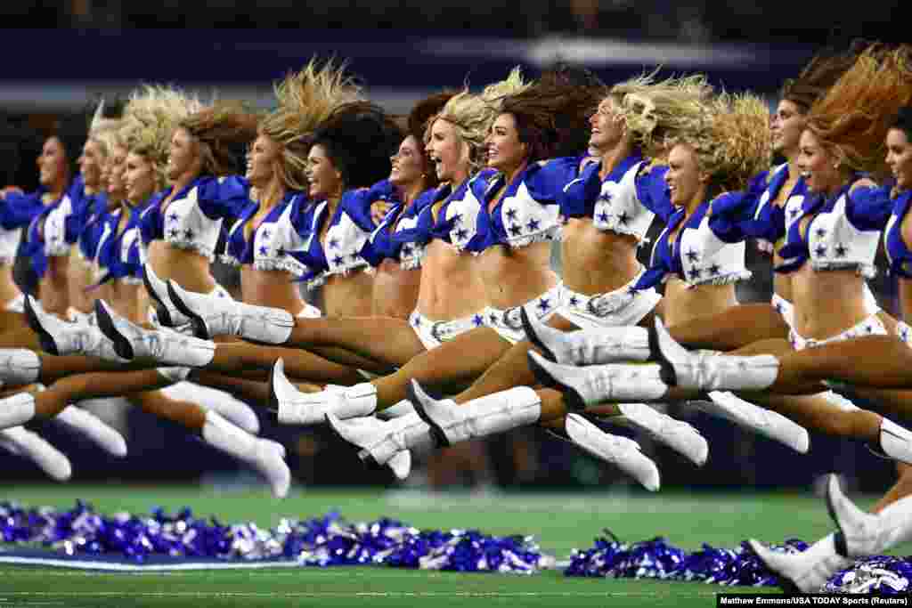 Dallas Cowboys cheerleaders perform prior to the game against the Houston Texans at AT&amp;T Stadium in Arlington, Texas, Aug. 24, 2019.