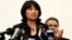 FILE - Chai Ling, a former student leader during the Tiananmen Square protests, speaks as U.S. Representative Chris Smith (R-NJ) stands behind her during a news conference on Capitol Hill in Washington, January 18, 2011.