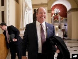 FILE - Ted Yoho, a Republican congressman from Florida, smiles following a TV interview on Capitol Hill in Washington, March 23, 2017.