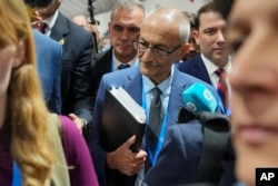 John Podesta, U.S. clime  envoy, walks done  a assemblage  during the COP29 U.N. Climate Summit connected  Nov. 23, 2024, successful  Baku, Azerbaijan.