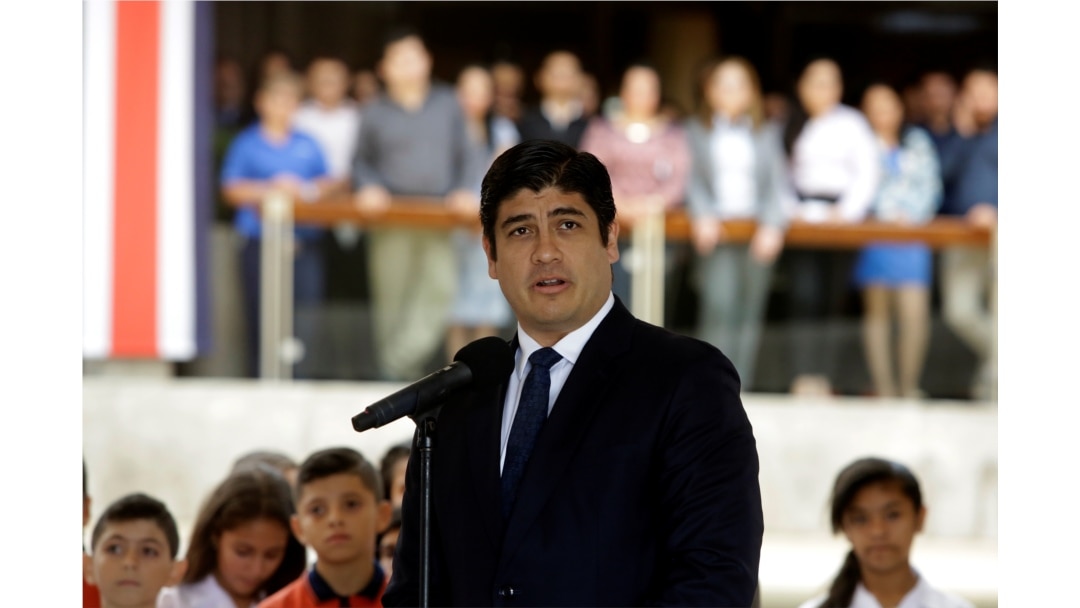 FILE - Newly-elected President Carlos Alvarado Quesada speaks during a welcome ceremony at the presidential house in San Jose, Costa Rica, April 18, 2018.