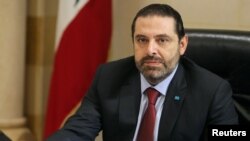 FILE - Lebanese Prime Minister Saad al-Hariri is seen during a meeting at the governmental palace in Beirut, Lebanon, Feb. 6, 2019. 