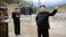 North Korean leader Kim Jong Un (R) gives field guidance during a visit to a construction site in this undated photo released by North Korea's Korean Central News Agency (KCNA) in Pyongyang, Sept. 14, 2015.