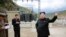 FILE - North Korean leader Kim Jong Un (R) gives field guidance during a visit to the construction site of the Paektusan Hero Youth Power Station near completion in this undated photo released by North Korea's Korean Central News Agency (KCNA) in Pyongyang.