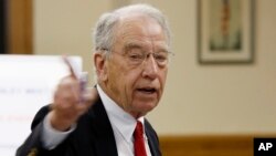 FILE - Sen. Chuck Grassley, R-Iowa speaks at a town hall meeting in Greenfield, Iowa, June 2, 2017.