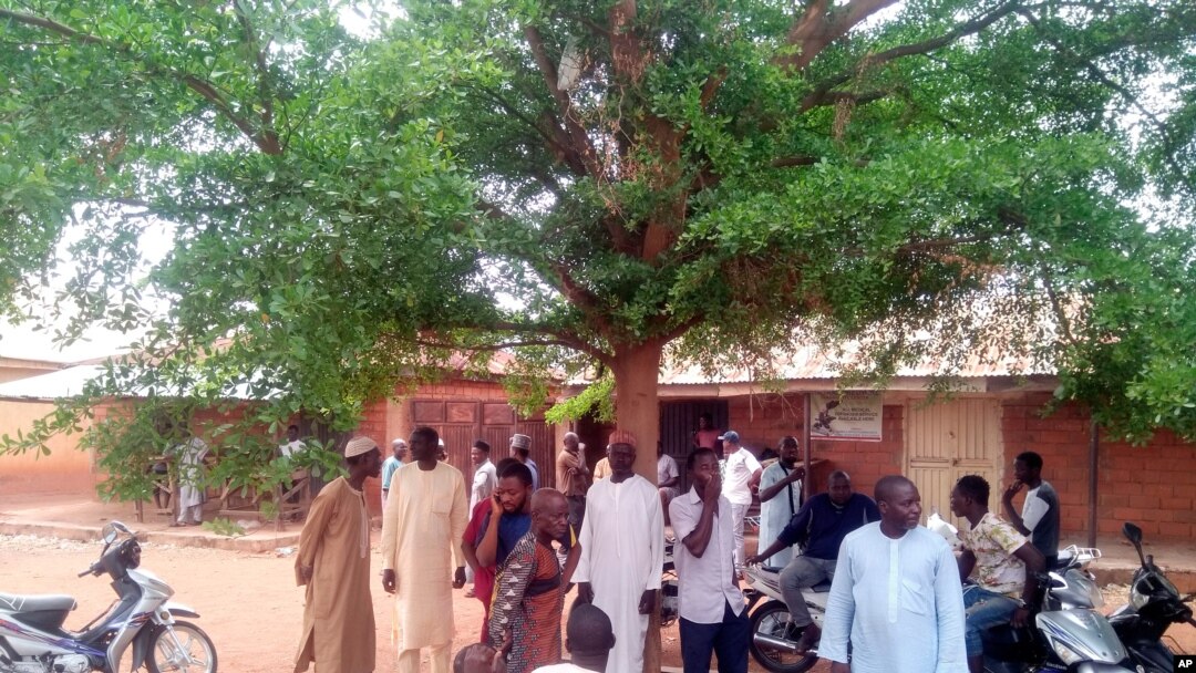Parents of abducted children of the Salihu Tanko Islamic School wait for news on their children in Tegina, Nigeria, June 1, 2021. A number of students were abducted Sunday and one person was killed at a school in Nigeria's north central Niger State.
