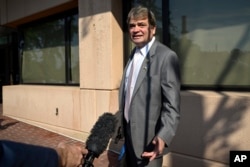 U.S. Representative Mike Quigley arrives at Democratic National Committee headquarters in Washington to discuss the 2024 election and President Joe Biden's candidacy on July 9, 2024. He told reporters, "He just has to step down. He can't win."
