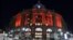 FILE - South Station is illuminated red to raise awareness for the bleeding disorders community on World Hemophilia Day, April 17, 2016, in Boston. A new gene therapy is offering hope for a cure for hemophilia.
