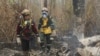 <font style="vertical-align: inherit;"><font style="vertical-align: inherit;">Los bomberos trabajan para controlar un incendio forestal en Río Blanco, Bolivia. (REUTERS) </font></font><br />
&nbsp;