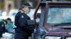 Police stop drivers at a checkpoint, set up in response to the state of Victoria's surge in coronavirus disease cases and resulting suburb lockdowns, in Melbourne, Australia, July 2, 2020. 