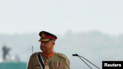 Pakistan's Army Chief of Staff General Qamar Javed Bajwa, walks as he arrives to attend the Pakistan Day military parade in Islamabad, Pakistan, March 23, 2019.