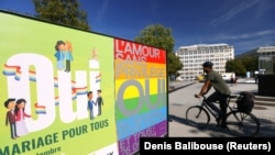 Posters are pictured before of a vote on same sex marriage in Geneva, Switzerland.