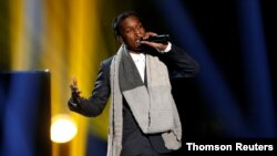 FILE - A$AP Rocky performs "I'm Not the Only One" with Sam Smith, not pictured, during the 42nd American Music Awards in Los Angeles, Nov. 23, 2014. 
