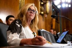 FILE - Sen. Marsha Blackburn, R-Tenn., takes notes during a Senate Judiciary Hearing on Capitol Hill in Washington, July 14, 2021.