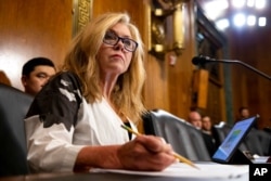 FILE - Sen. Marsha Blackburn, R-Tenn., takes notes during a Senate Judiciary Hearing on Capitol Hill in Washington, July 14, 2021.