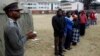 People wait to cast their votes in Mbare township outside Harare July 31, 2013.