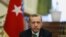 FILE - Turkish Prime Minister Recep Tayyip Erdogan attends a news briefing.