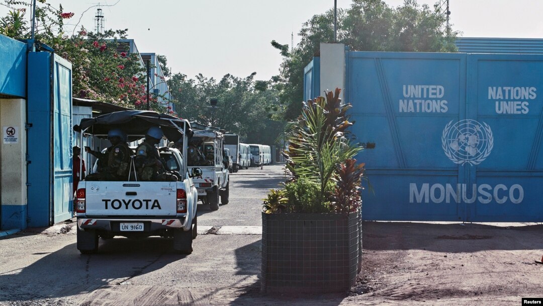 FILE - Peacekeepers serving in the United Nations Organization Stabilization Mission in the Democratic Republic of the Congo (MONUSCO) drive into their compound after patrolling the streets during mass protests against President Joseph Kabila in the capital, Kinshasa, April 10, 2017.
