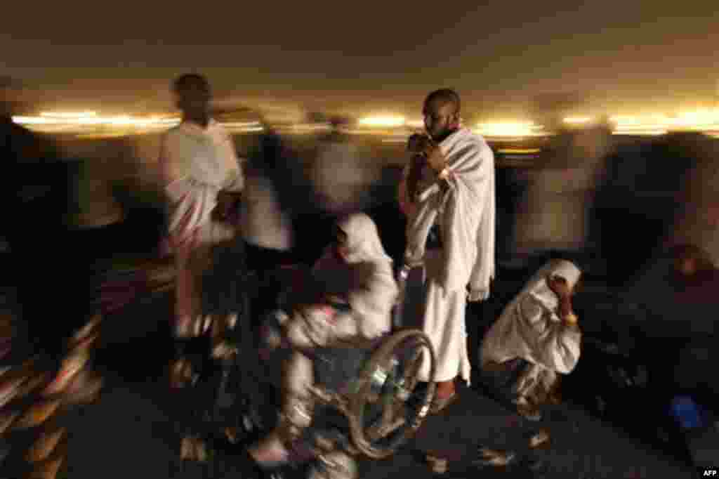 Muslim pilgrims head to Muzdalifa from Arafat outside Mecca, Saudi Arabia, Monday, Nov. 15, 2010. The annual Islamic pilgrimage draws 2.5 million visitors each year, making it the largest yearly gathering of people in the world.(AP Photo/Hassan Ammar)