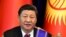 FILE - Chinese President Xi Jinping attends a joint news conference with Kyrgyzstan's President Sooronbai Jeenbekov, in Bishkek, Kyrgyzstan, June 13, 2019.