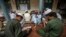 FILE - Pakistani religious students attend a lesson at Darul Uloom Haqqania, an Islamic seminary in Akora Khattak, Khyber Pakhtunkhwa province, Sept. 14, 2013. 
