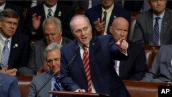 Steve Scalise speaks on the House floor of the Capitol in Washington, more than three months after a baseball practice shooting left him fighting for his life. 