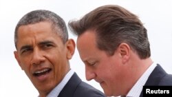 Predsednik Barak Obama i britanski premijer Dejvid Kameron tokom sastanka G8 u Severnoj Irskoj, 18. juni, 2013.