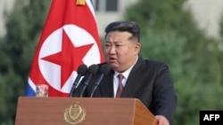 FILE - This picture taken on October 7, 2024 and released from North Korea's official Korean Central News Agency (KCNA) via KNS on October 8, 2024 shows North Korean leader Kim Jong Un delivering a speech at Kim Jong Un University of National Defense.