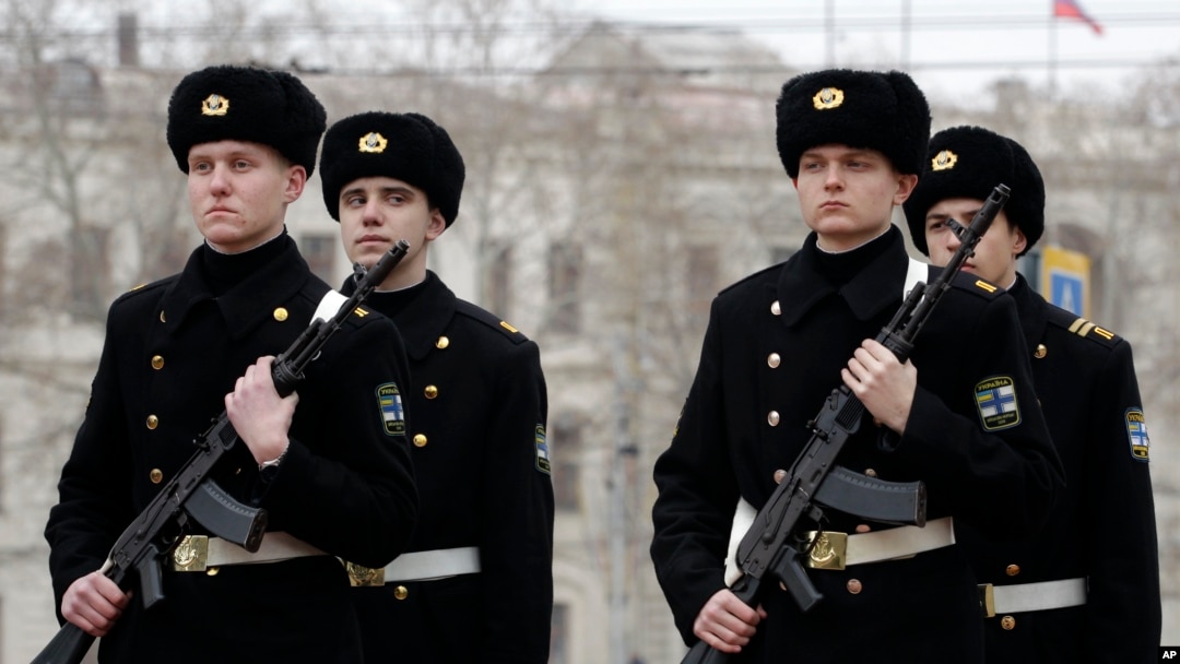 Ukrainian sailors march in the Ukrainian Black Sea port of Sevastopol in the Crimea, Ukraine, Feb. 24, 2014. 