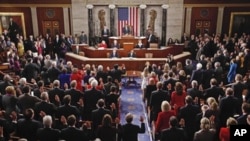 House members take their oath of office during the first session of the 112th Congress, on Capitol Hill in Washington, Wednesday, Jan. 5, 2011. (AP Photo/Charles Dharapak)