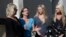 Bonnie Schaan, second from left, discuss her daughter, Cheyeanne Fitzgerald, who was wounded in the shooting at Umpqua Community College, during a news conference outside Mercy Medical Center, Saturday, Oct. 3, 2015, in Roseburg, Oregon.