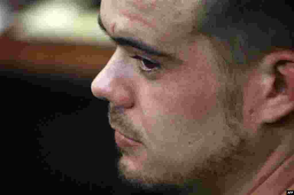 Joran van der Sloot sits in the courtroom before his sentencing at San Pedro prison in Lima, Peru, Friday Jan. 13, 2012. Van der Sloot, 24, will be sentenced Friday for the 2010 murder of Stephany Flores, a young woman he met at a Lima casino. Prosecutor