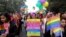 Gay rights activists and their supporters hold colorful balloons and placards as they participate in a gay pride parade in New Delhi, India, Nov. 12, 2017. 